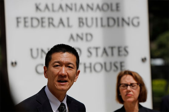 Hawaii judge freezes Trump's revamped travel ban