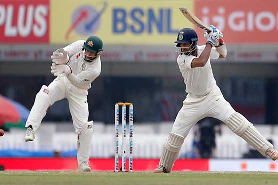Pujara, Saha make Australia toil