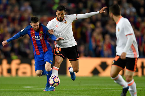 Football: Messi double edges six-goal thriller Barca's way