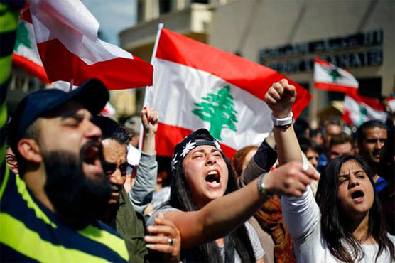Lebanese descend on capital to protest proposed tax hikes
