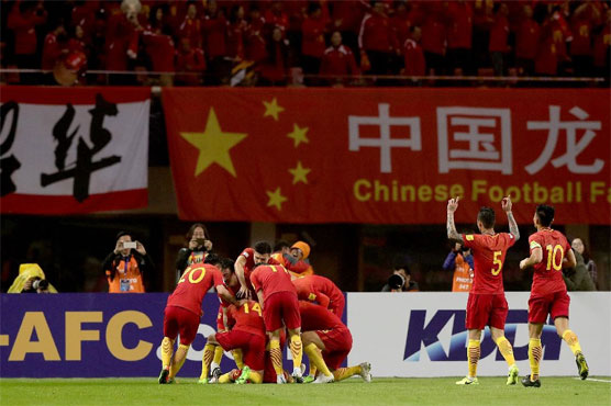Football: Lippi's China keep World Cup dream alive, Qatar slump