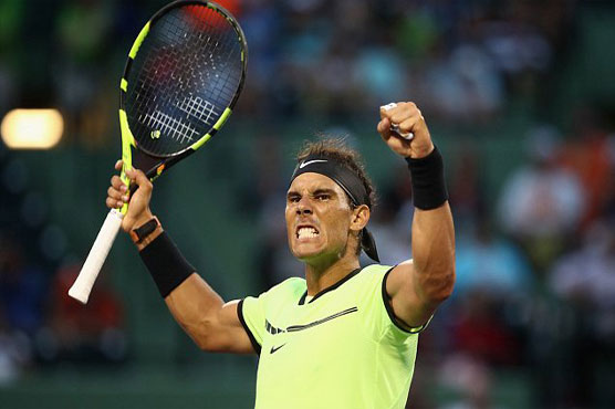 Tennis: Nadal rallies to reach fourth round in Miami