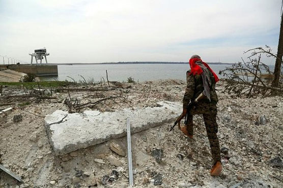 US-backed forces battle IS around key Syria town of Tabqa