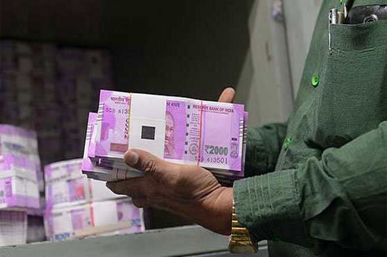 India finding it hard to end love affair with cash