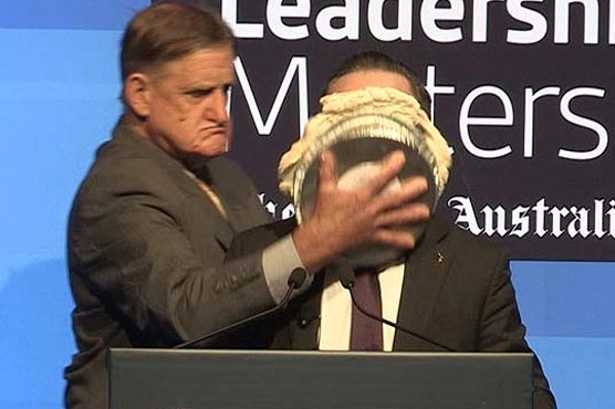 Australia's Qantas Airways boss slapped with pie during speech