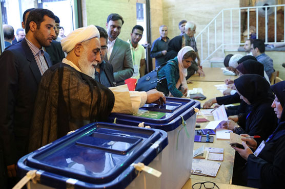 Iran voters to give verdict on economy, diplomacy