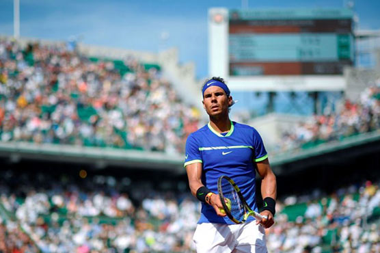 Nadal, Djokovic march on as Muguruza survives