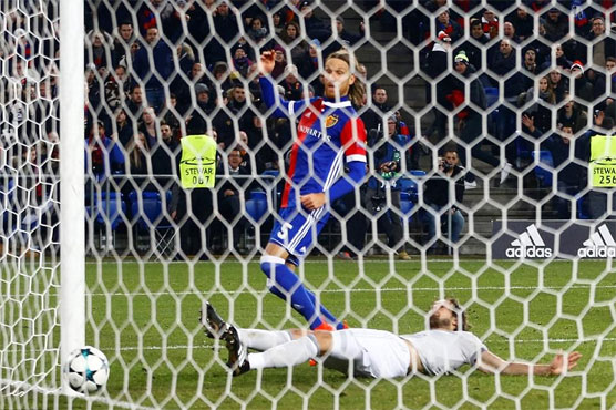 Football: United rocked by Basel late show