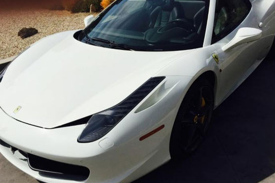 Stolen Ferrari trashed; man arrested after seeking gas money