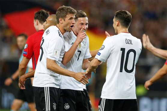 Football: Rudy stunner helps Germany ease into World Cup finals
