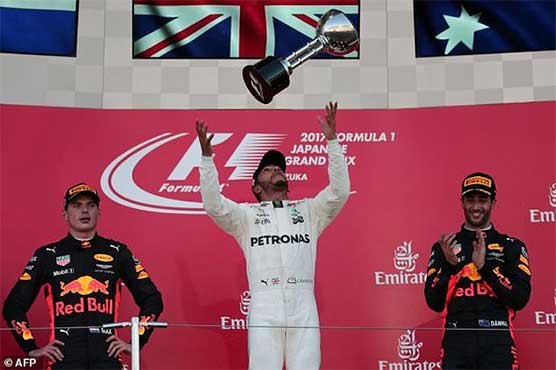 Formula One: Ruthless Hamilton roars to Japan win