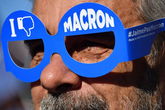 Thousands join French public sector strike against Macron