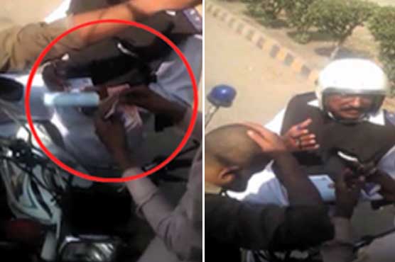 Karachi: Traffic warden taking bribe caught on camera