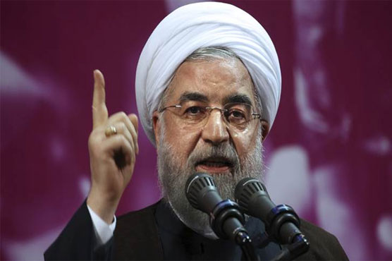 Rouhani says Iran will keep producing missiles, state TV reports