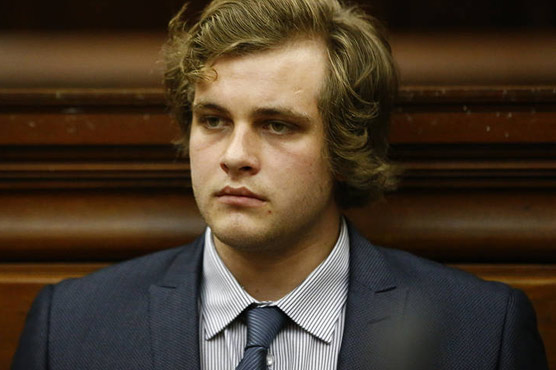 Son accused of killing his wealthy S.African family testifies