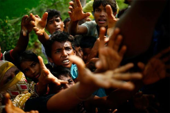 Crisis looms as nearly 125,000 refugees flood into Bangladesh