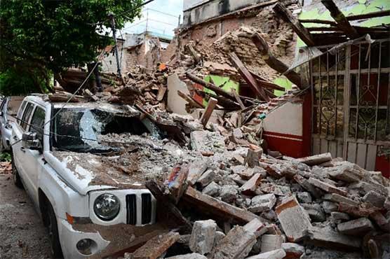 Mexico quake kills 65, deadly storm strikes