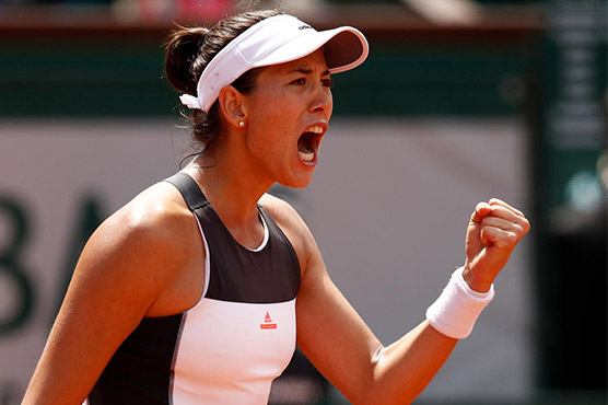 World number one Muguruza powers into Wuhan quarters