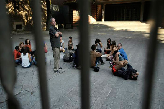 Catalans occupy polling stations ahead of contested vote