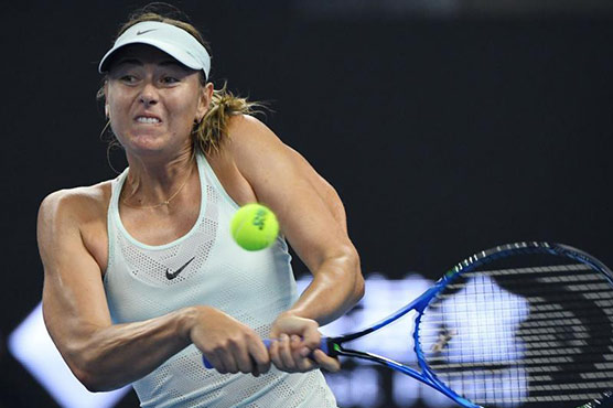 Sharapova digs deep in China Open epic