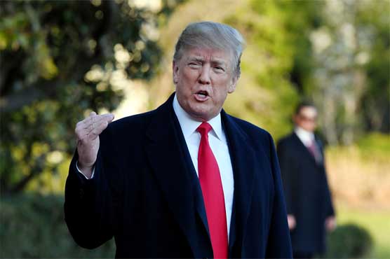 Trump says Mexico not stopping migrant flow, threatens NAFTA