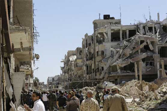 Fighters start to quit last rebel pocket of Syria's Ghouta