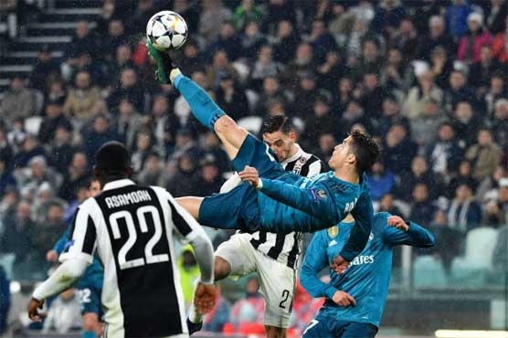 Ronaldo magic fires Real past 10-man Juventus