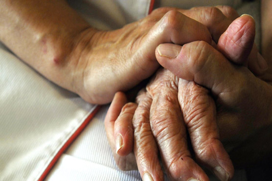 Experts urge on diagnosing Alzheimer's by brain changes, not symptoms