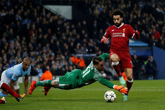 Guardiola sent off as Salah sends Liverpool into semi-finals