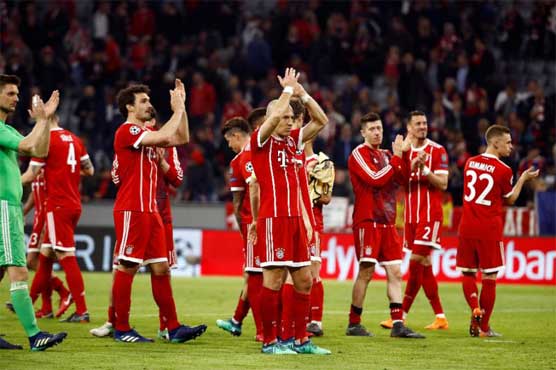 Bayern toil but overcome Sevilla to reach semi-finals