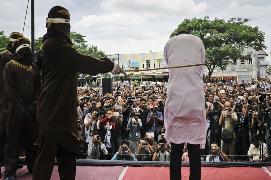 Indonesia's Aceh to stop whipping criminals in public: officials