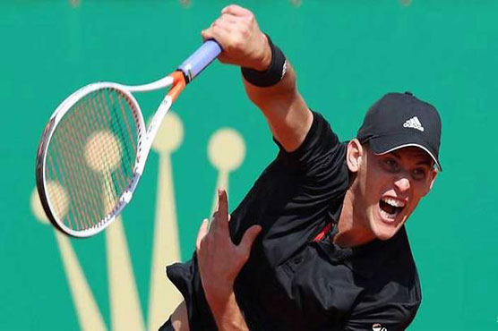 Thiem saves match point in victory over Rublev