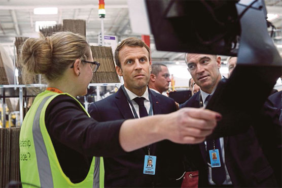 Macron faces spreading student protests, rail strikes