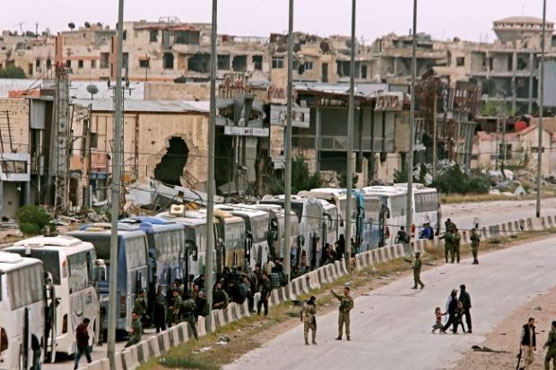 Rebels begin leaving new area outside Damascus