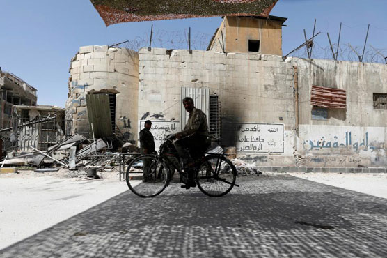 Experts take samples from site of alleged Syria gas attack