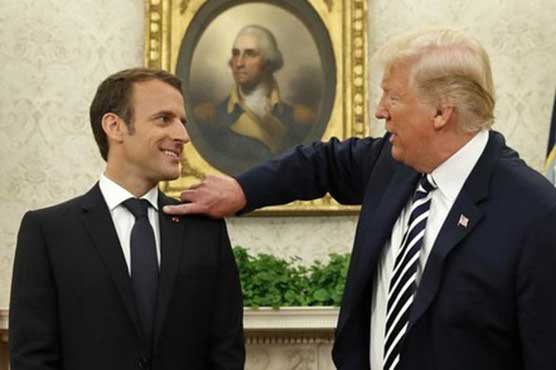 Trump wipes dandruff off visiting French President Macron