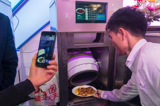 Man turns wife's criticism of his culinary skills into a robotic cooking machine