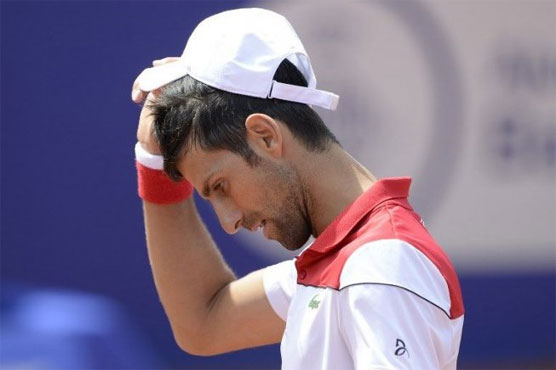 Djokovic suffers surprise Barcelona defeat, Nadal cruises