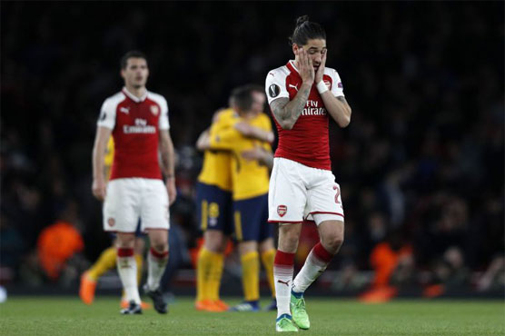 Profligate Arsenal punished by 10-man Atletico Madrid