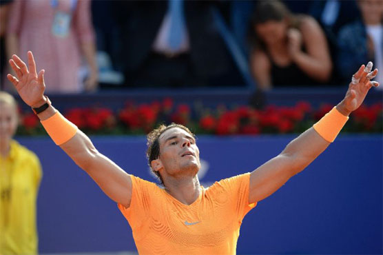 Battling Nadal one win away from 400 on clay
