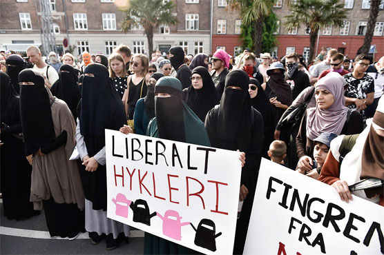 Women defiant as Danish ban on full-face veil takes effect