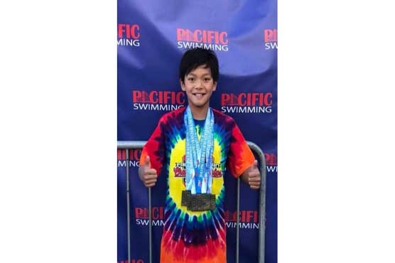 Phelps congratulates 10-year old who broke his youthful record