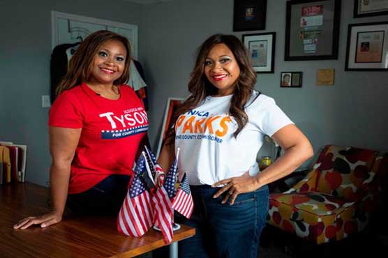 Michigan twins from different parties advance in election