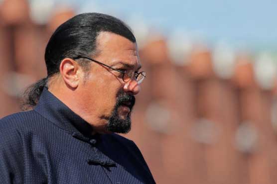 Los Angeles prosecutors review sex assault cases against actors Seagal, Anderson