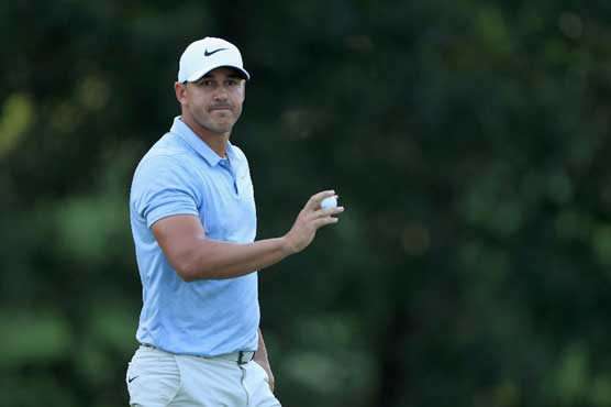 Koepka grabs PGA lead as Tiger joins crowded title hunt