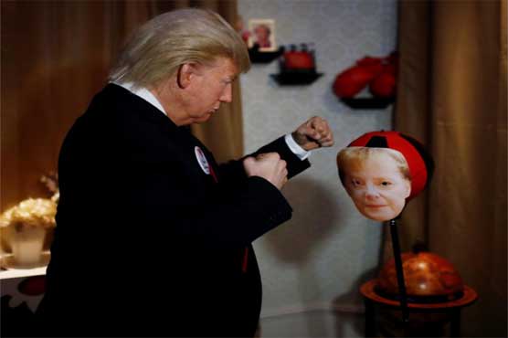Trump 'live figure' thumps Merkel at Berlin's Madame Tussauds