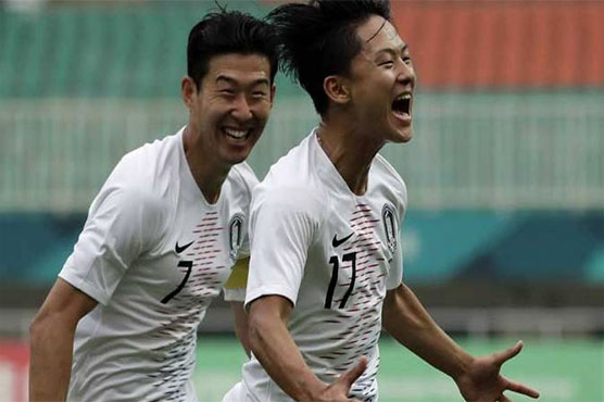 Precious gold glitters for Son, Bahraini claims sprint double