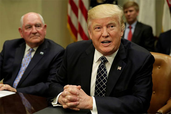 Trump signals retreat on wall funding, but shutdown threat remains