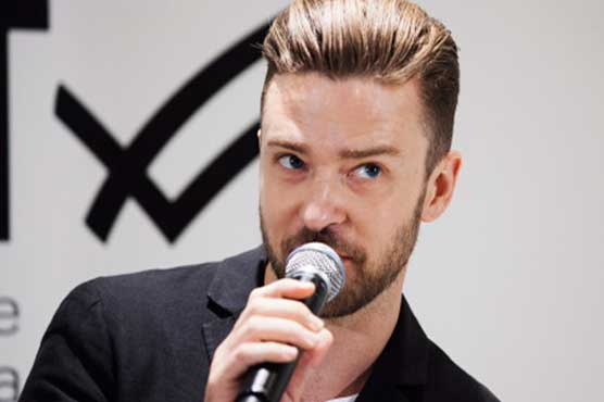 Still sexy but now fatherly, Justin Timberlake returns