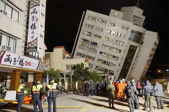 Rescuers scour toppled buildings after Taiwan quake kills four